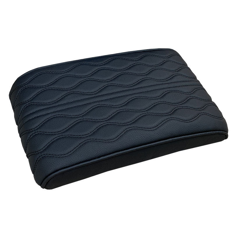 High-density memory foam vehicle armrest cushion from a side angle