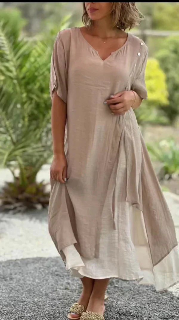 Woman wearing khaki layered V-neck asymmetric midi dress outdoors