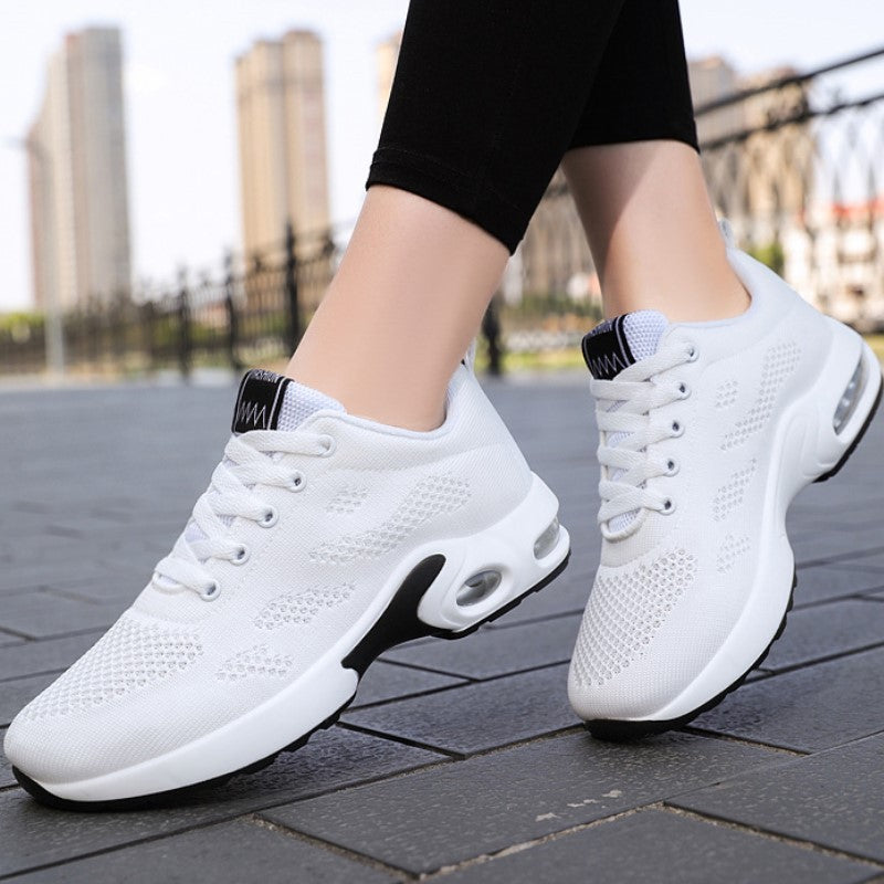 Cloudelle women's casual orthopedic sneakers in white, showing side profile and comfortable arch support sole.