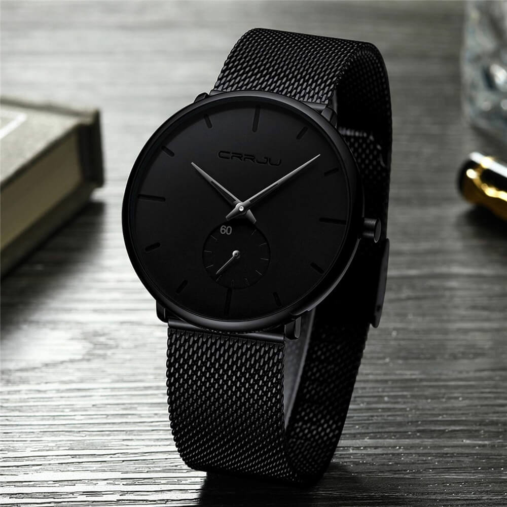 Mens minimalist luxury quartz watch featuring a sleek black dial