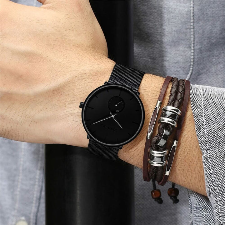Water resistant mens quartz watch resting on a modern surface