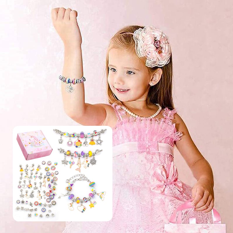 Young girl wearing handmade charms from the DIY bracelet kit