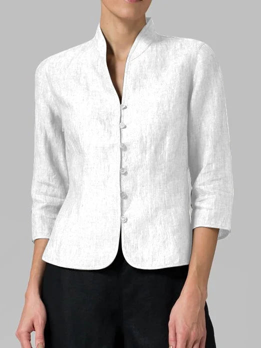 Women's elegant mandarin collar blouse with button front in minimalist style