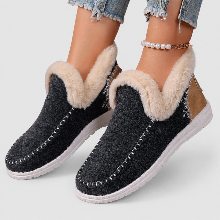 Relaxing indoor footwear featuring orthopedic support and warm fleece