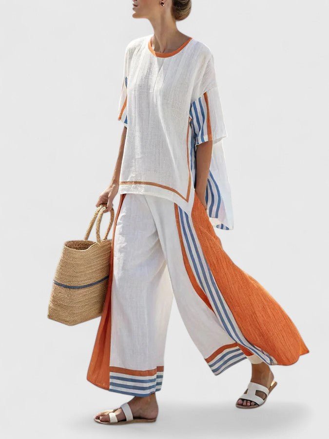 Side angle of the casual oversized two-piece outfit featuring wide-leg trousers for vacation wear.