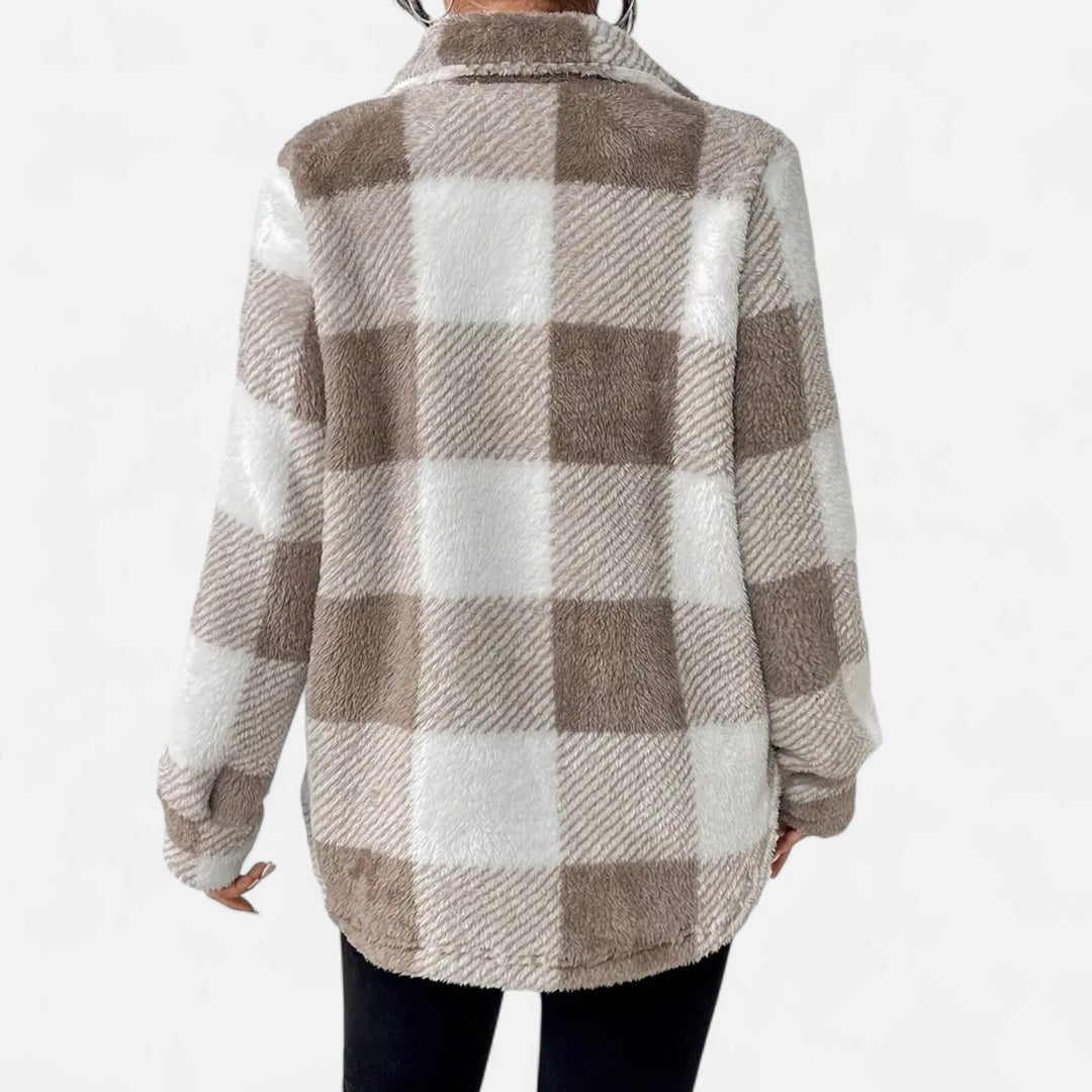 Flat lay styling of women's plaid oversized shacket with winter fashion accessories