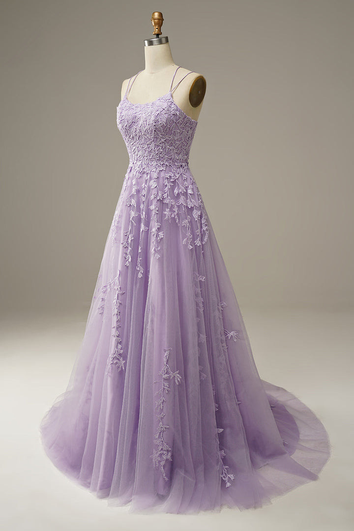 Side profile of the elegant tulle evening gown highlighting the flowing skirt layers