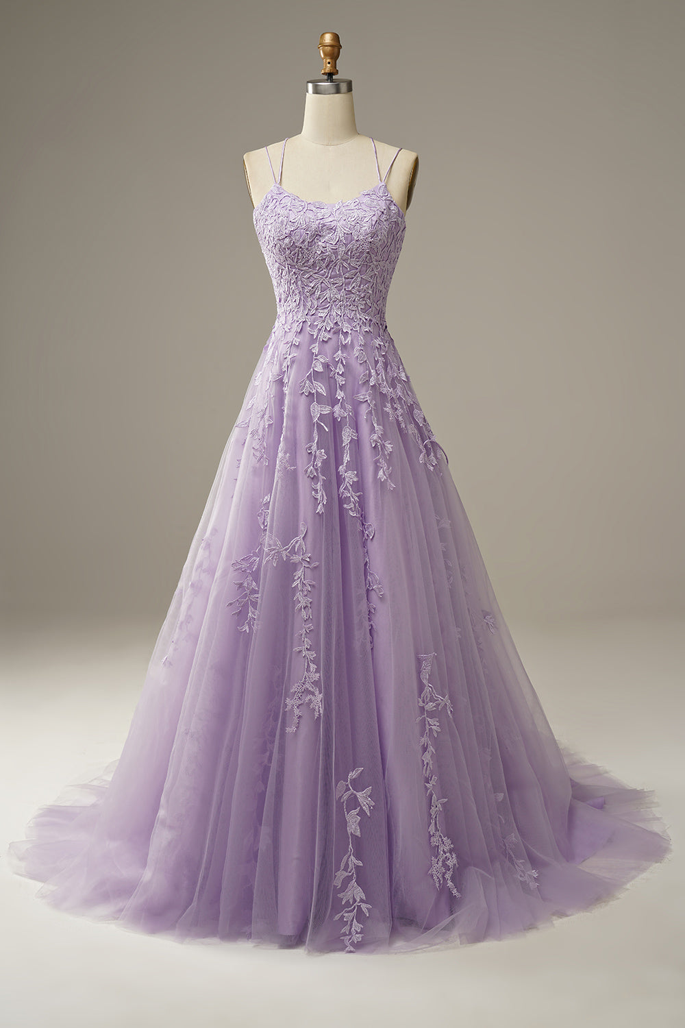 Front view of a lilac tulle evening gown on a mannequin displaying detailed bodice embroidery