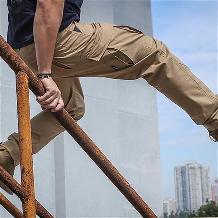 Grey mens outdoor hiking trousers with multiple utility cargo pockets