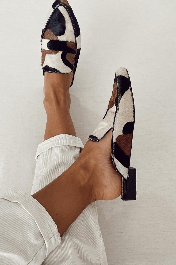 Side angle of printed fashion slip-on flats and everyday shoes