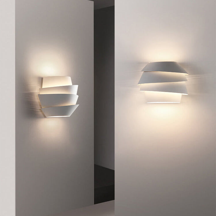 Perspective shot of the modern iron wall lamp installed in a corridor
