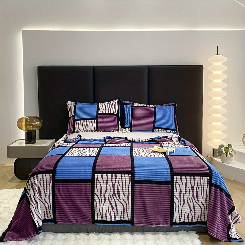 Decorative bedding accessory with a stylish flannel fleece blanket spread out