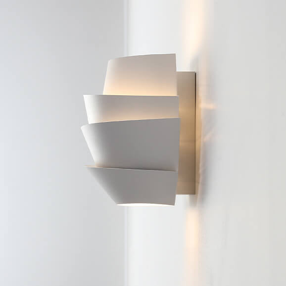 Close-up of the iron wall lamp fixture highlighting durable metal construction