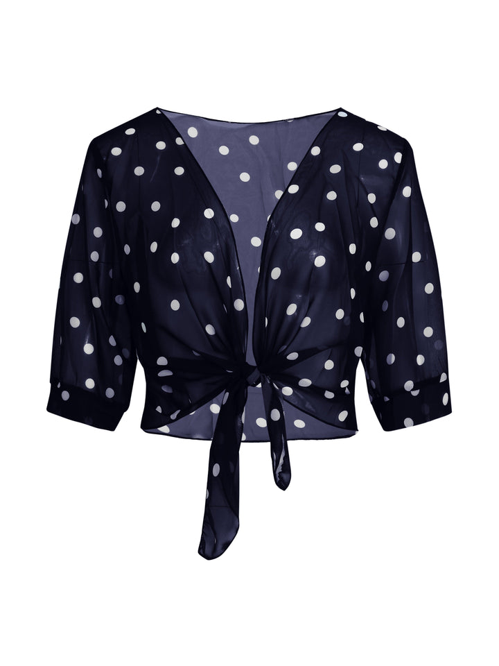 Women's polka dot tie-front blouse in black, showcasing short sleeves and casual chic style