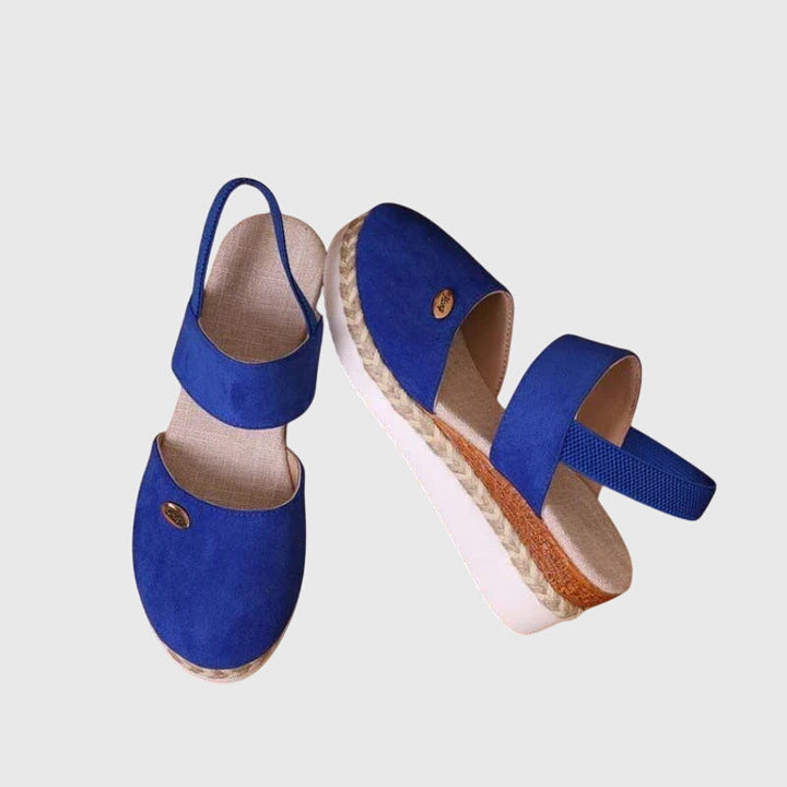 Womens slingback sandals displayed on a neutral background