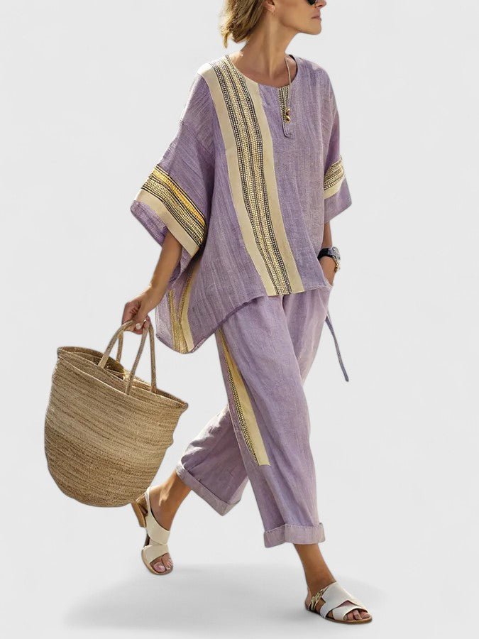 Women's oversized two-piece set in a neutral tone, front view showing relaxed fit and summer style.