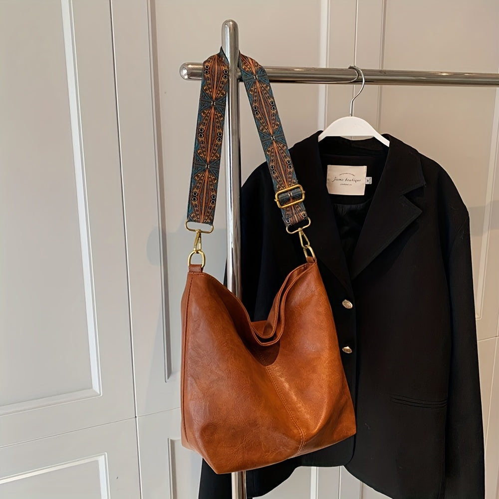 Large capacity crossbody bag featuring a bold retro geometric pattern