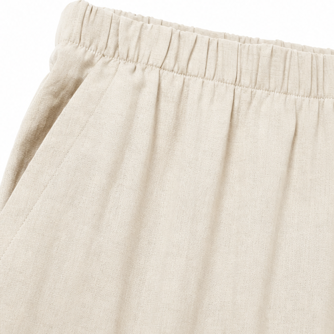 Detailed shot of the neat neckline and stitching on the womens linen fashion top