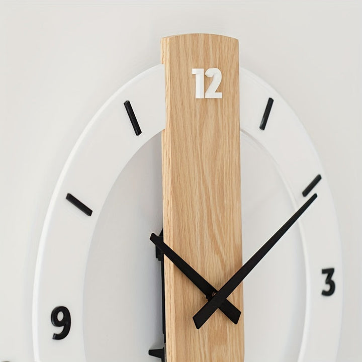 Detail shot of the clock hands and minimalist dial on the modern wooden wall clock