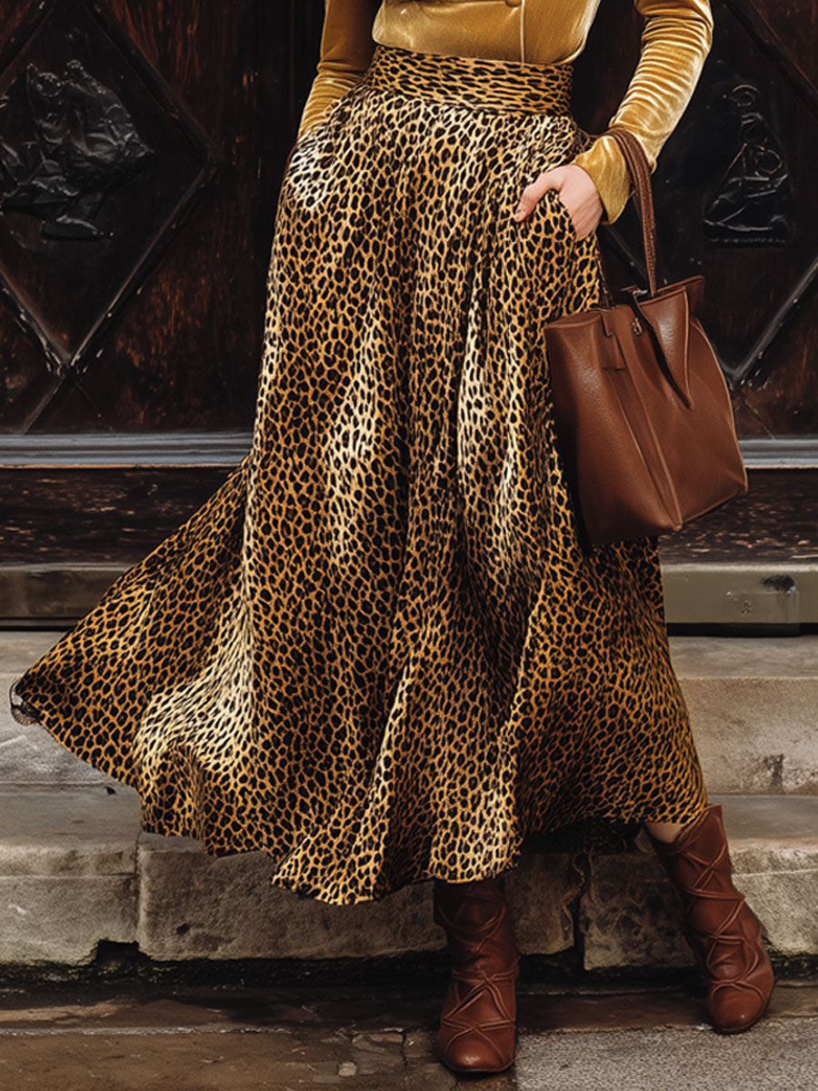 Full view of women's velvet v-neck shirt and leopard skirt two-piece party outfit set