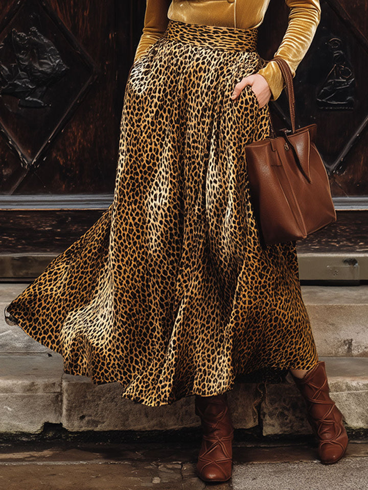 Full view of women's velvet v-neck shirt and leopard skirt two-piece party outfit set