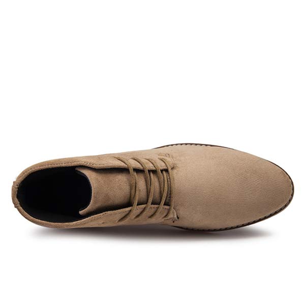 Top-down view of men's lace-up ankle shoe opening and toe shape