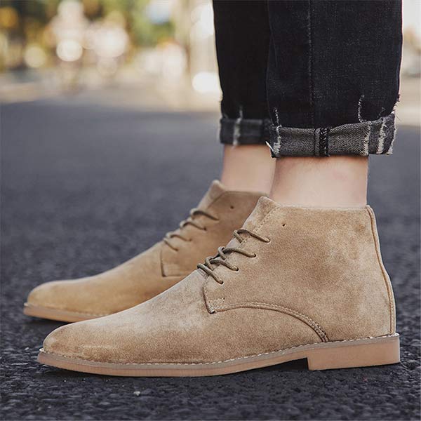Angle shot of khaki ankle boots showcasing premium suede texture