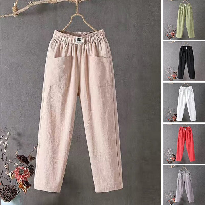 Light pink women's trousers with elastic waist and side pockets