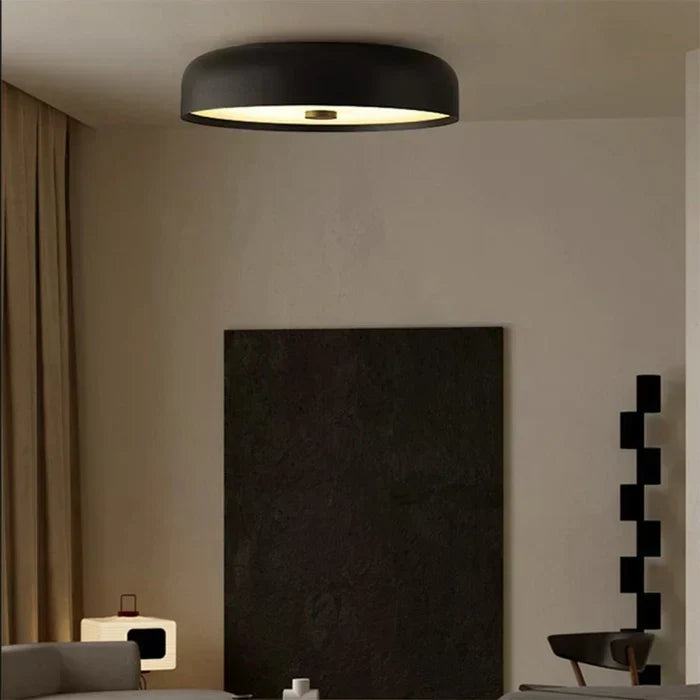 Interior design showcase featuring the sleek ceiling light in a stylish bedroom.