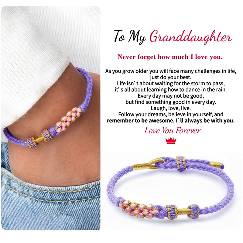 Purple grandmother granddaughter blossom knot bracelet worn on wrist with message card