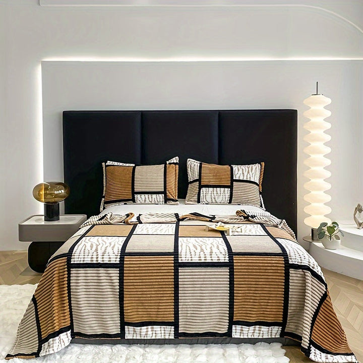 Ultimate comfort soft blanket rolled up with a ribbon, ideal for gifting