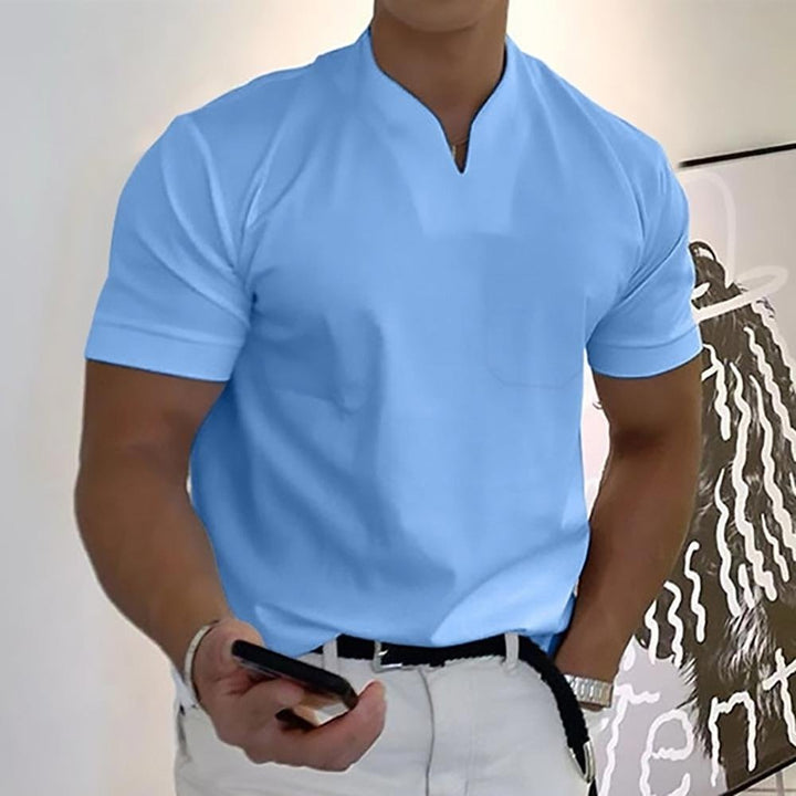 Close-up of the durable button detail on the refined men's polo