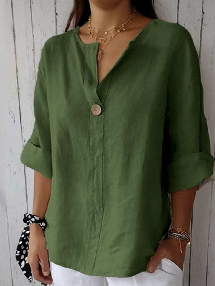 Back view of the casual V-neck top showing relaxed fit design