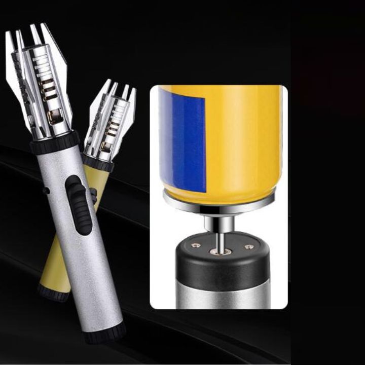 Compact butane torch lighter held in hand