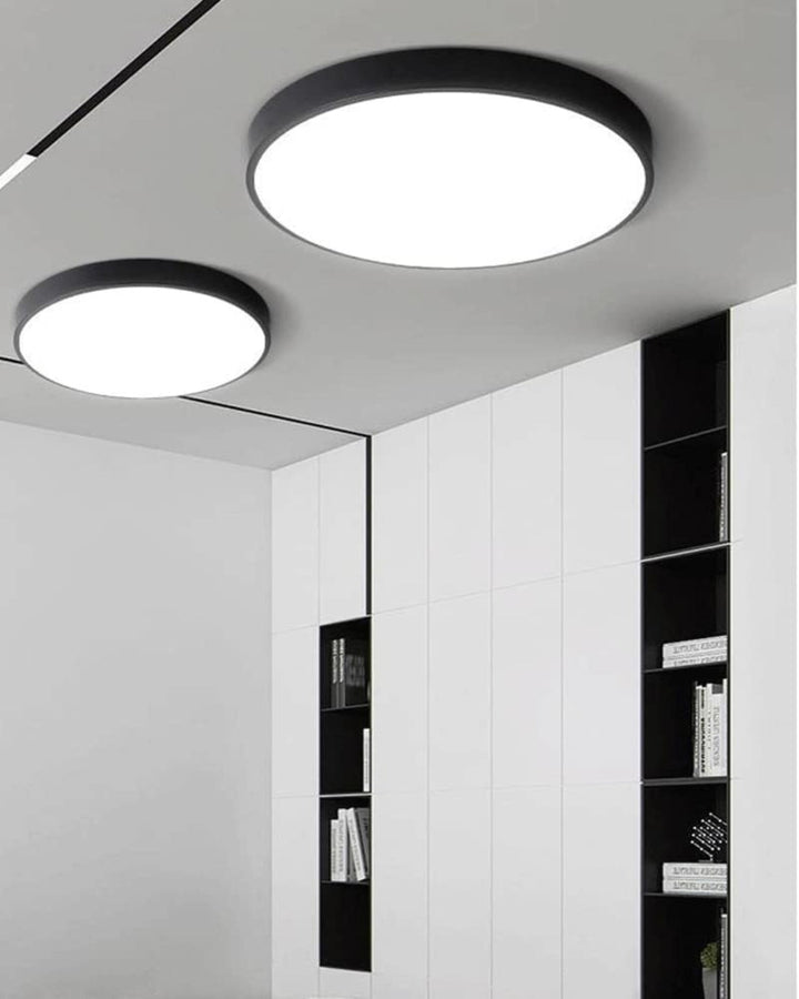 Modern black LED ceiling lamps installed in a contemporary hallway