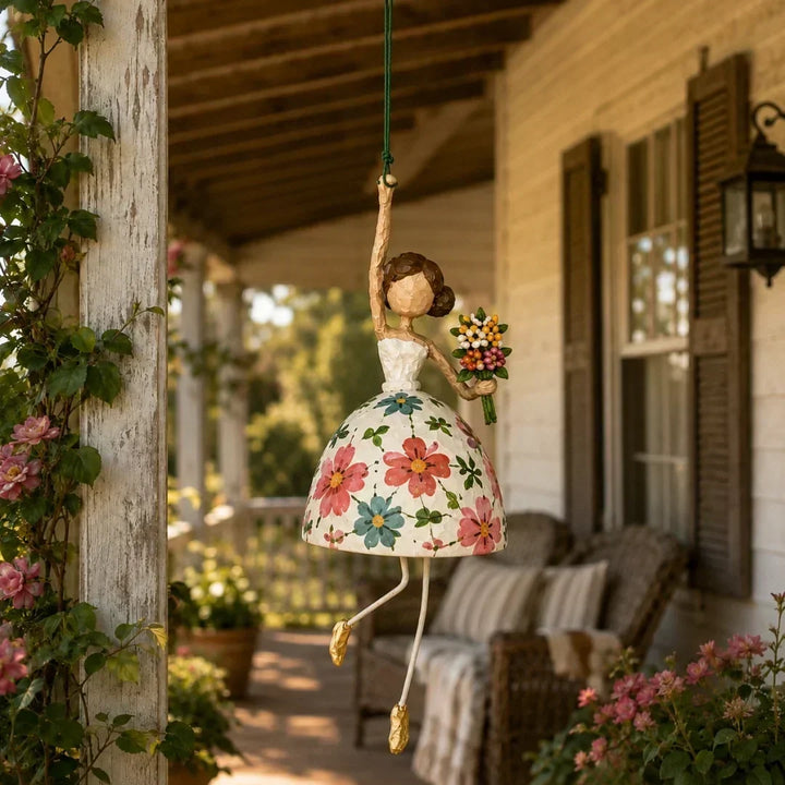 Close-up of the whimsical dancing lady hanging ornament texture and color