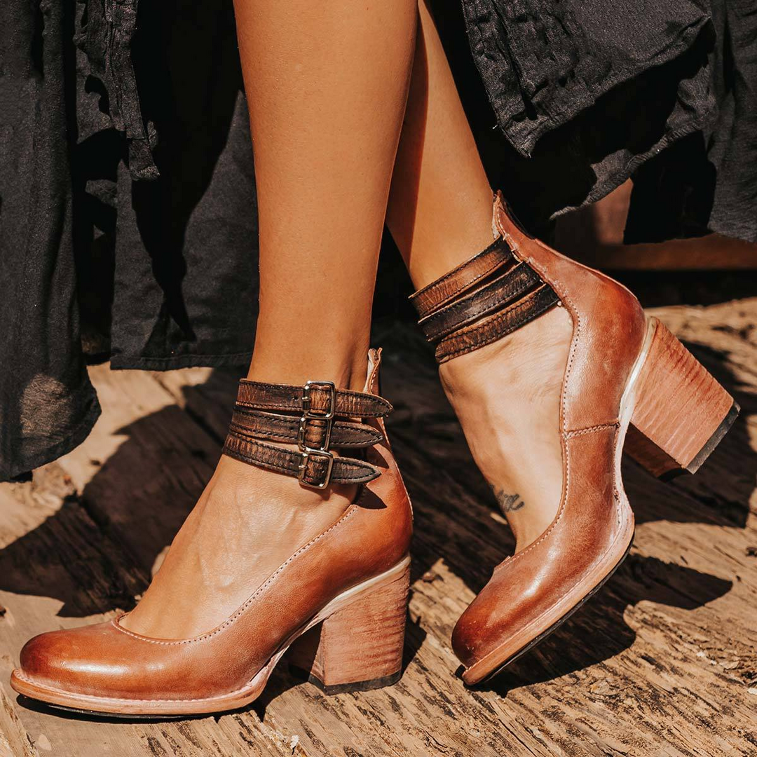 Side view of women's comfortable classic strap heels and buckle