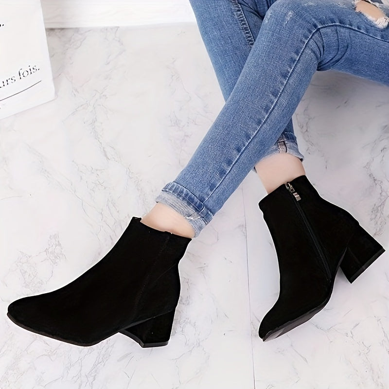 Back view of women's brown chelsea boots showing elastic side panels