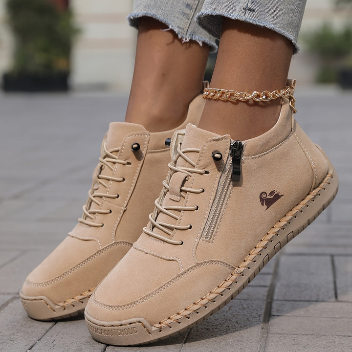 Ankle sneakers for women featuring secure lace-up closure and cushioning