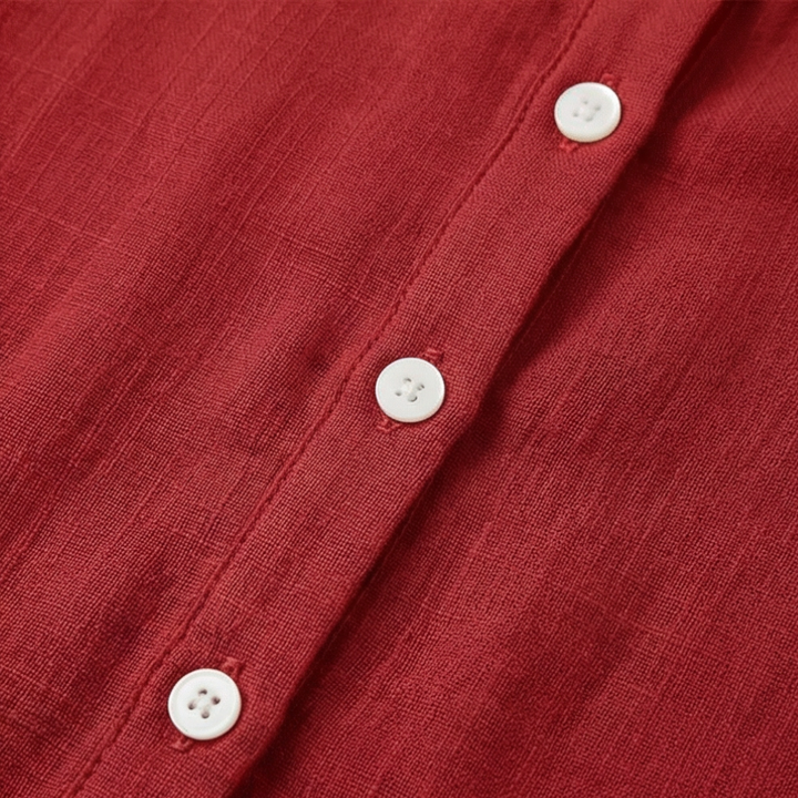 Side profile of women's retro Peter Pan collar button-up blouse