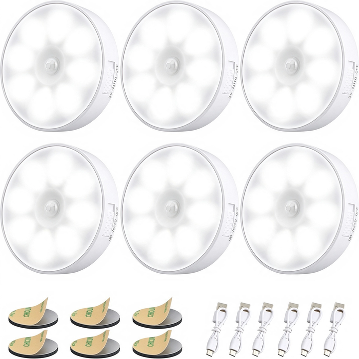 Six pack of white circular motion sensor lights with adhesive pads and USB cables