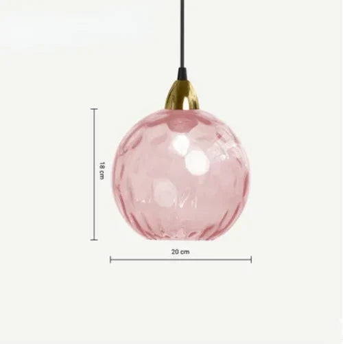 Sleek glass globe ceiling lamp lit up in a hallway