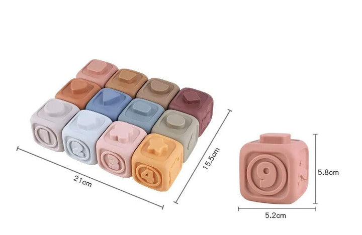 Baby gift set featuring pastel silicone stacking blocks and toys