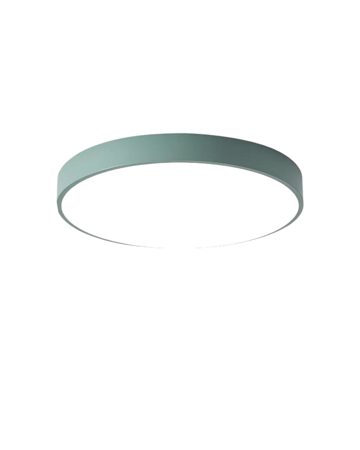 Ambient bedroom lighting provided by a sleek flat disc LED fixture