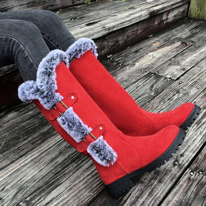 Top opening of knee-high boots showcasing plush faux fur trim