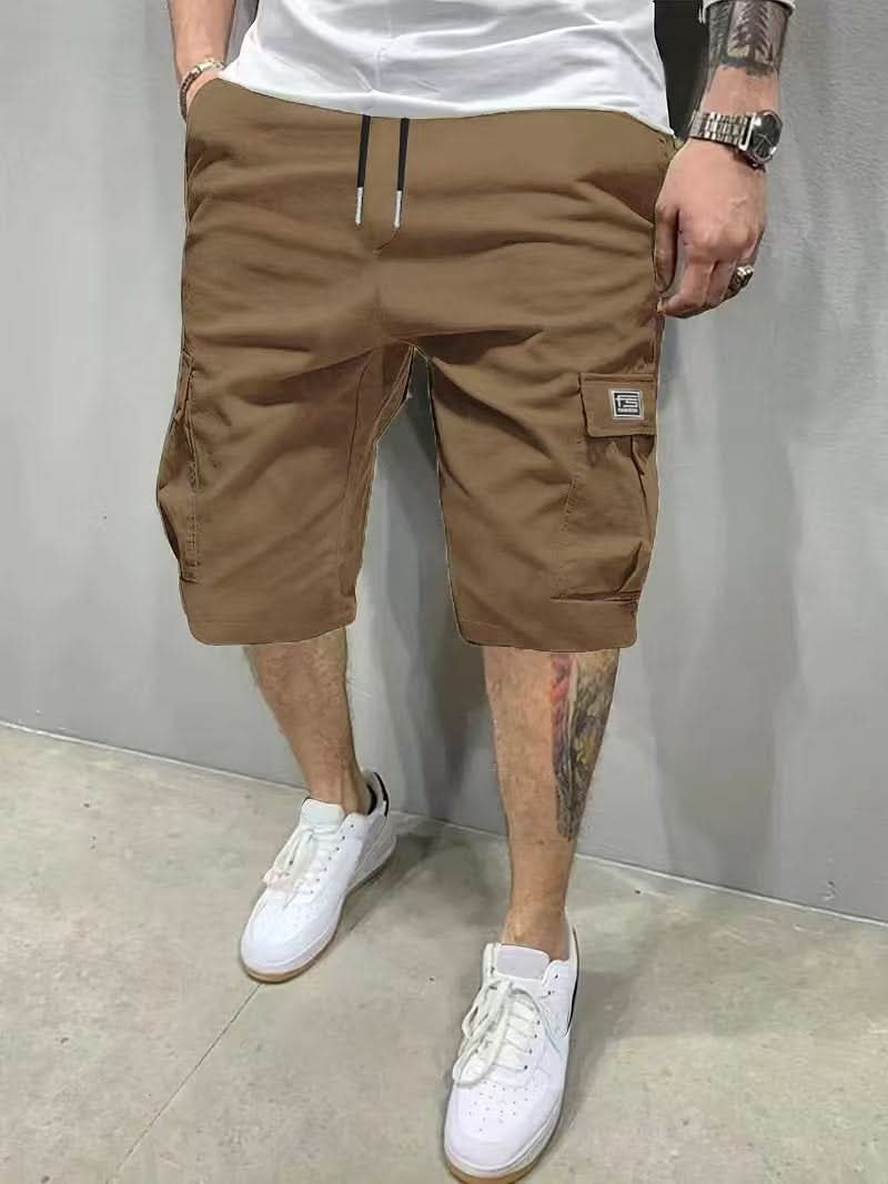 Detailed shot of cargo pockets on casual mens summer fashion shorts