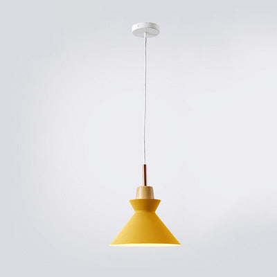 Set of two metal pendant lights hanging symmetrically in a hallway
