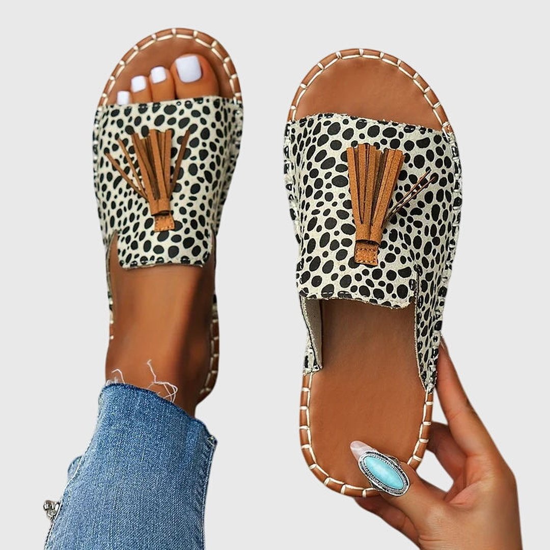 Side view of summer comfort sandals for women featuring cushioned sole and slip-on design