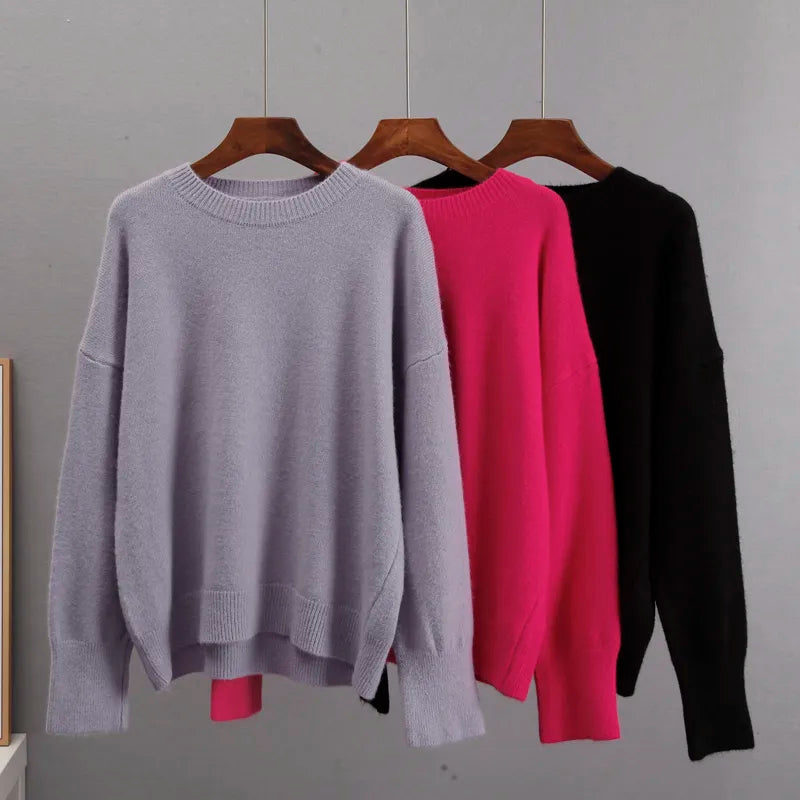 Back view of the blue women's jumper featuring a classic knit pullover design