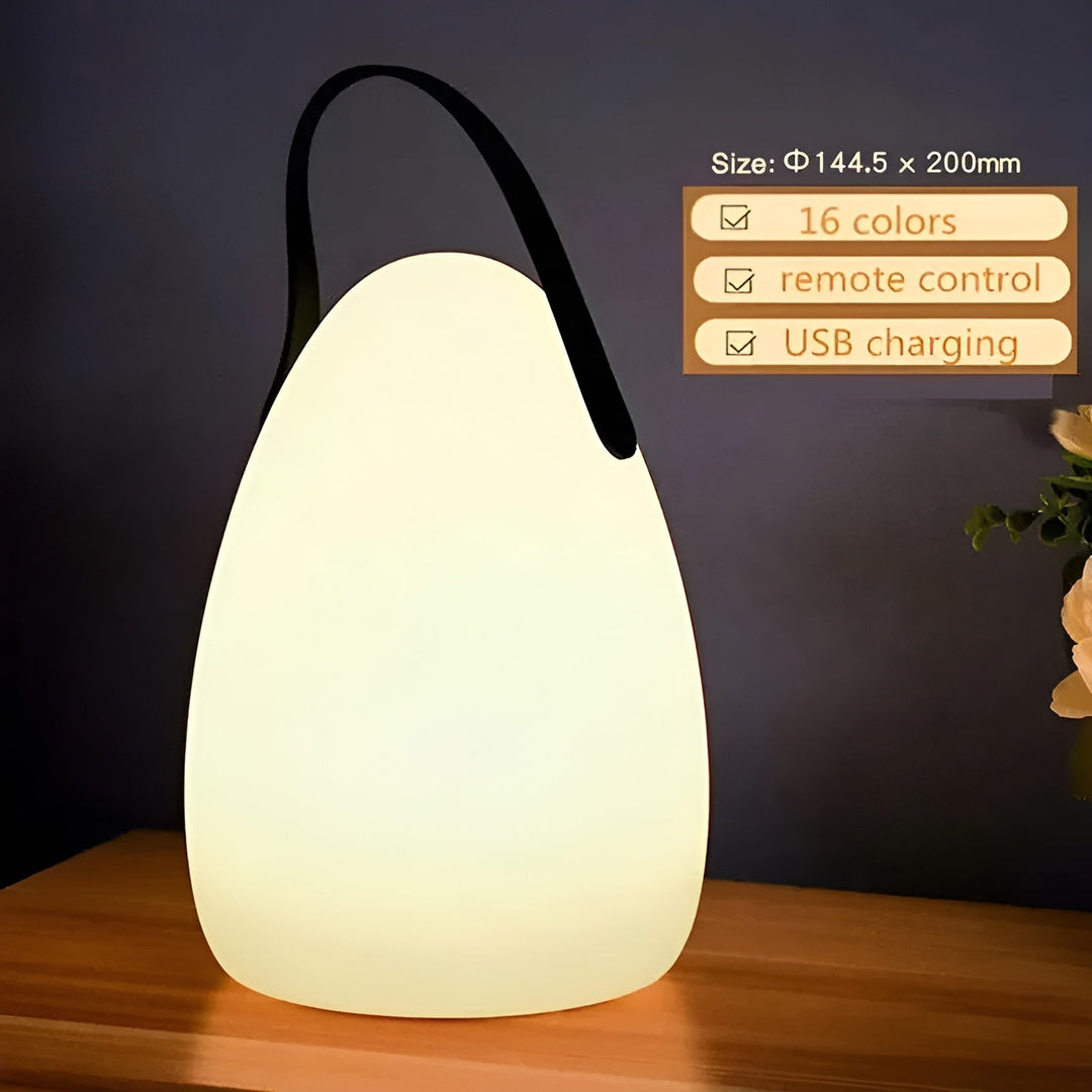 Portable waterproof RGB LED lamp style A glowing softly on a wooden surface with size and feature indicators.